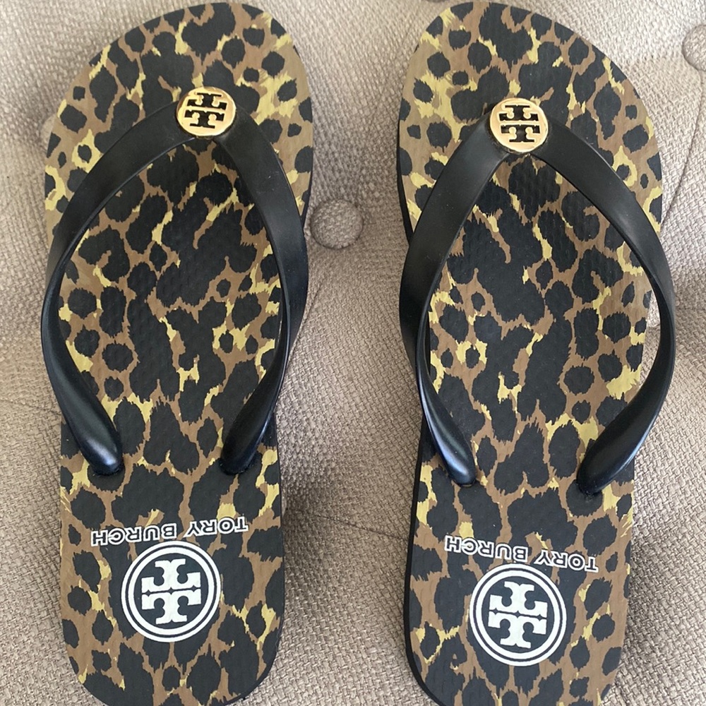 Never worn Tory Burch cheetah print flip flops